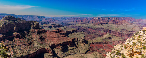 A panorama showing the coloured rock strata of the Grand Canyon showing the north rim, south rim...