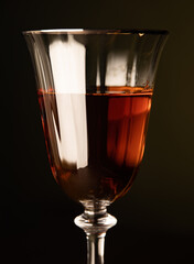 Cognac wine glass with amber-colored cognac.