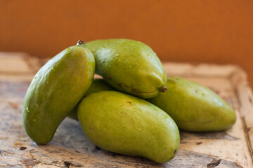 June 22, 2020, La Paz Mexico, green mangoes are the most abundant fruits in the months of July and August.