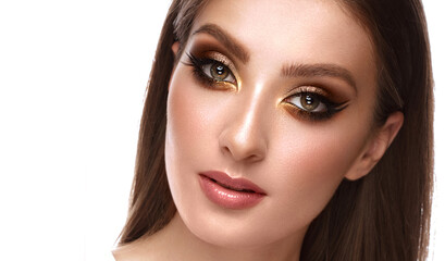 Fototapeta premium Beautiful girl with bright fashionable make-up and long thick hair. Beauty face.
