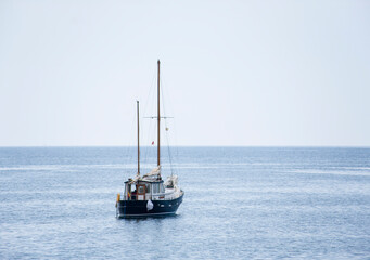 Obraz premium Old sailing ships anchored at the mouth of the port, in the bay of Aguilas, Spain