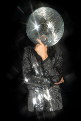 Mr disco ball wearing silver jacket dancing