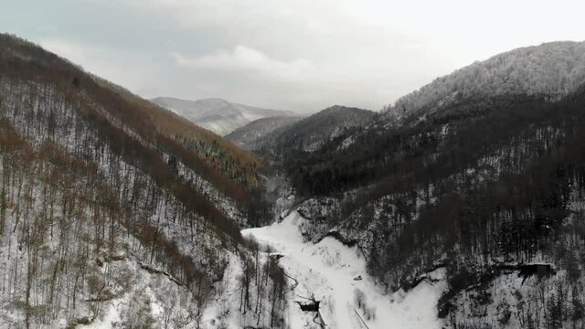Panoramic view of Abant. Amazing picturesque valley in winter time. Ascending above a beautiful snowy forest in the mountain, Turkey