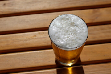 Pilsen, golden craft beer on sunny day