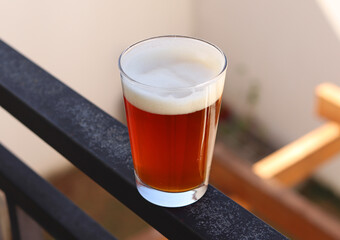 India Pale Ale, amber ale craft beer on sunny day