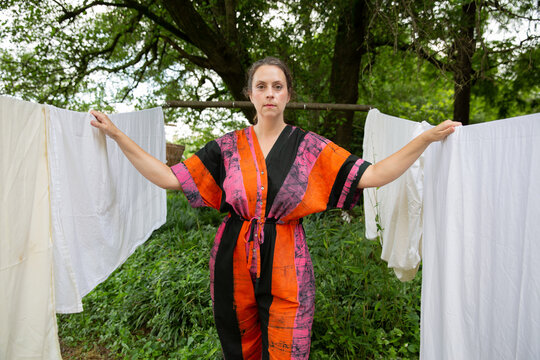 woman in colorful jumpsuit with clothesline  4