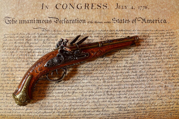 Declaration of Independence with a double barrel flintlock pistol
