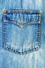 clothing items blue stonewashed faded jeans cotton fabric texture with seams, clasps, buttons and...
