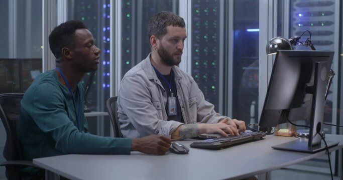 Young programmers working in data center