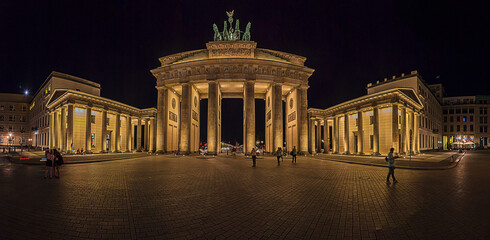 Night view over Paris square to illuminated Brandenburger gate in Berlin in summer © Aquarius