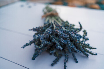 Fresh lavender handmade bunches on the light wooden table