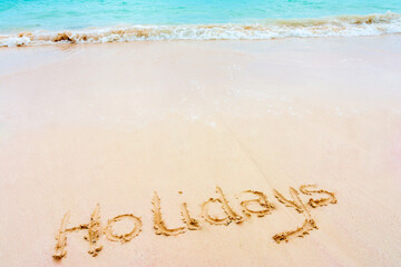 Holidays drawn on the sand in Bavaro beach, Punta Cana, Dominican Republic