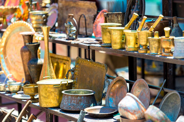 copper stuff sold as a souvenir or antiques vintage on a market in Armenia
