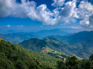 mountains and clouds top of the mountains Dhanaulti Uttarakhand india
