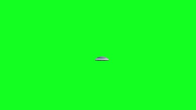 Flying saucer isolate on green screen. UFO. Realistic shaders and motion blur. 4K animation.