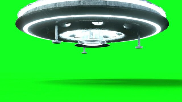 Flying saucer isolate on green screen. UFO. Realistic shaders and motion blur. 4K animation.