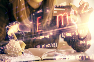 Multi exposure of woman on-line shopping holding a credit card and formula drawing. E-learning concept.