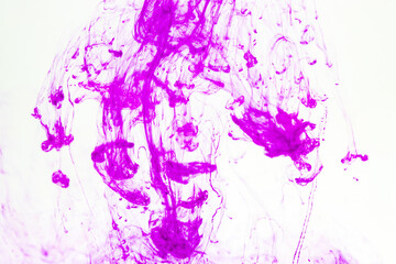 Purple ink in water