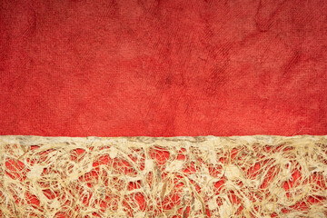 Amate bark paper with lace design against red huun paper.  This ancient paper dates back to pre-Columbian and Meso-American times and is still hand made by the Otomi Indian artisans of Mexico.