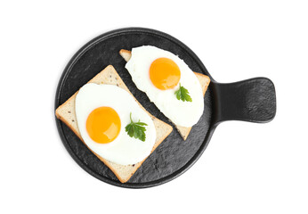 Tasty fried eggs with bread and parsley isolated on white, top view