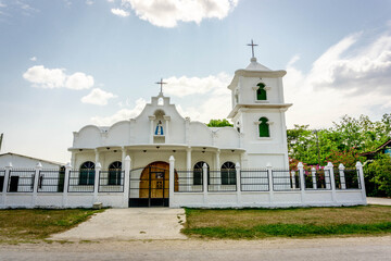 Fototapeta na wymiar Catholic church near Yaxha ruins in Guatemala.