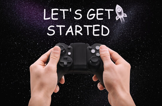 Man with video game controller and phrase LET'S GET STARTED against night sky, closeup