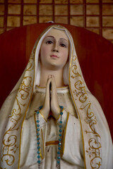 Close up of Statue of Our lady of grace virgin Mary in the church, Thailand. selective focus.