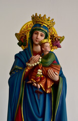 Closeup of Our lady of perpetual help statue virgin Mary with Child Jesus in the church, Thailand. selective focus. - obrazy, fototapety, plakaty