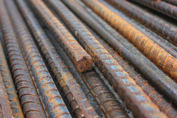 Close up deformed steel rusty background. Rusty steel bar in the construction site.