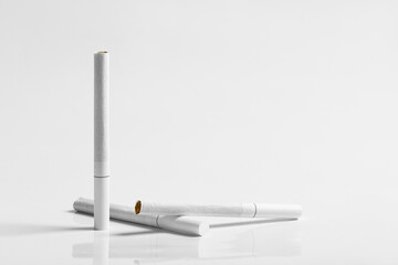 White cigarette on white background