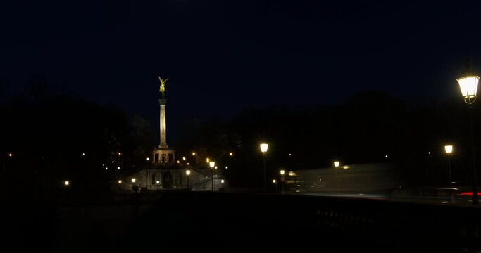 Motionlapse, showing the Friedensengel statue in the center of Munich, Germany during night.
