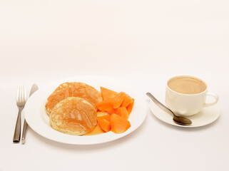 Delicious breakfast shot isolated against a white background. 