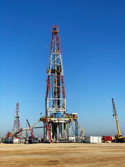 A portrait shot of a land drilling rig