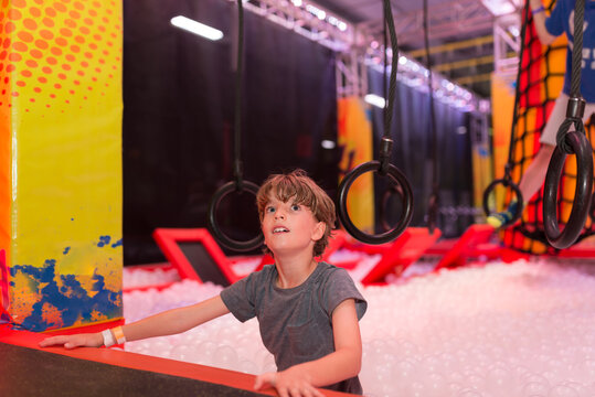 Boy Doing An Indoor Obstacle Course