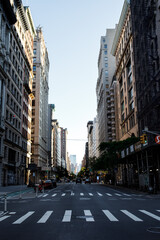 New York street pedestrian direction sign. Street name signs in Manhattan. Building sign. New York streets. Empty streets. New York buildings.  Old architecture buildings in Manhattan. Home facades. 