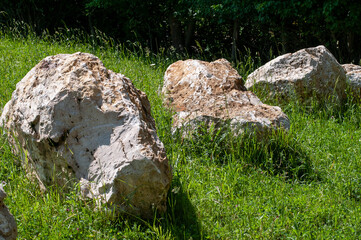 large boulders of jurassic limestone in bright sunlight