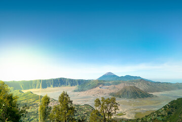 Mount Bromo is an active volcano, Indonesia. Panorama Bromo with blue sky background