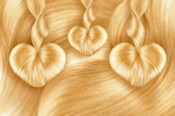 Heart made by natural blond hair. Creative background