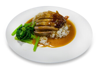 Roasted Duck Rice with Cantonese vegetables, focus selective on white background