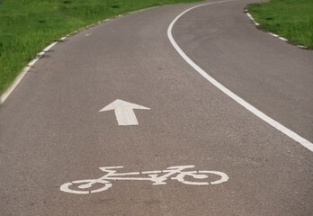 Fototapeta premium bicycle sign on bike lane in public park