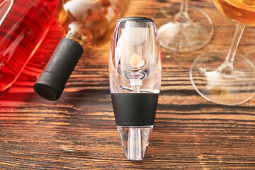 Wine aerator on wooden background