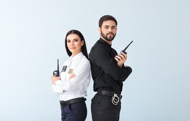 Police officers on light background