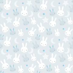 Baby boy nursery seamless pattern with white bunnies and cute rabbits and stars on light blue background.