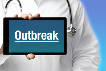 Outbreak (pandemic). Doctor in smock holds up a tablet computer. The term Outbreak is in the display. Concept of disease, health, medicine
