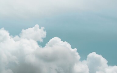 Cumulus white clouds in the blue sky