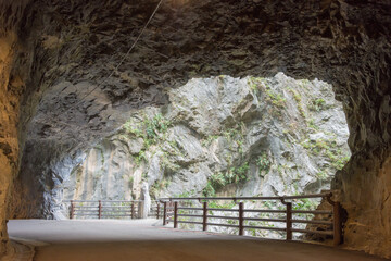 Jiuqudong (Tunnel of Nine Turns) at Taroko National Park. a famous tourist spot in Xiulin, Hualien, Taiwan.