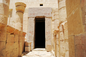 Ancient corridor with hieroglyphic inside Hatshepsut temple
