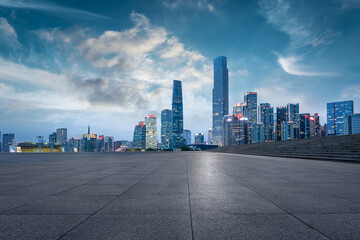 Empty square floor and modern city scenery at night in Shenzhen,China.