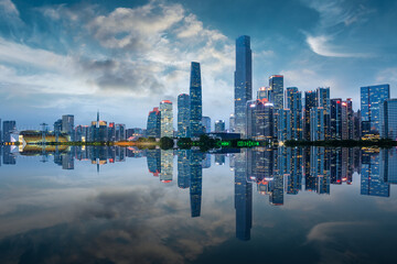 Obraz premium Guangzhou city skyline and architectural reflections at night,China.