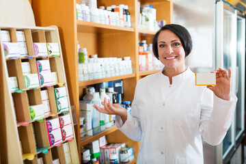 Woman pharmacist in store